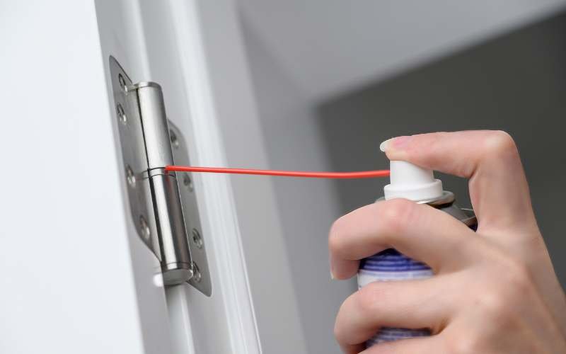 lubricating door hinges